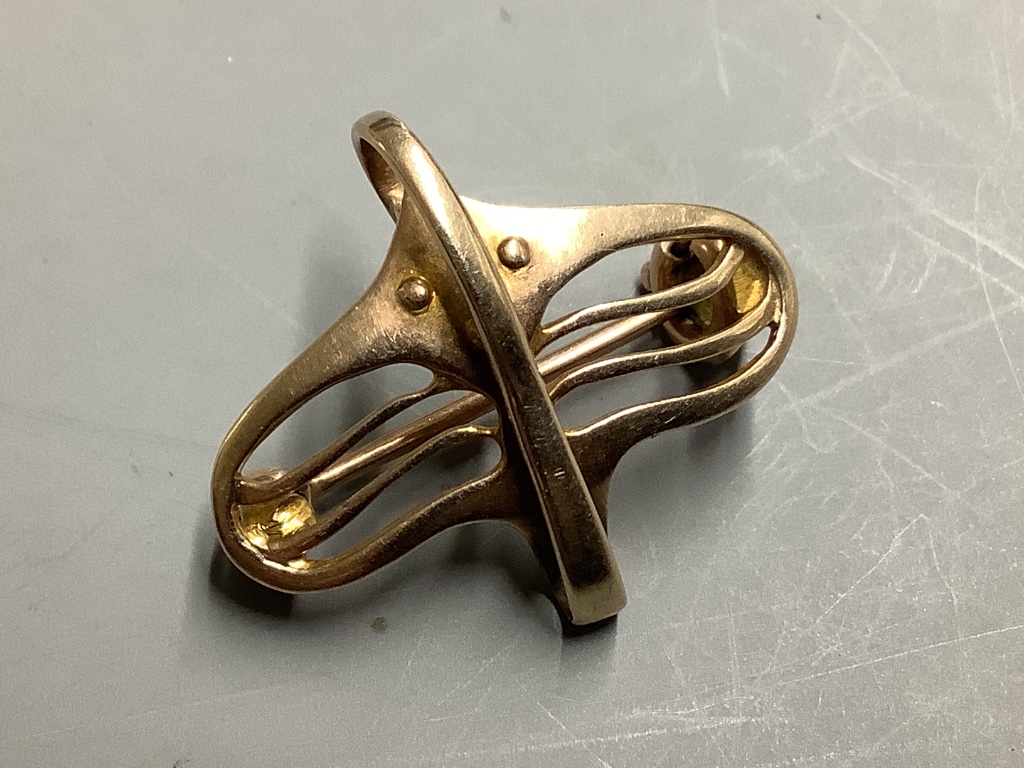 An early 20th century 9ct yellow gold brooch in the form of a stylised bird, by Murrle Bennett & Co, 2.9g